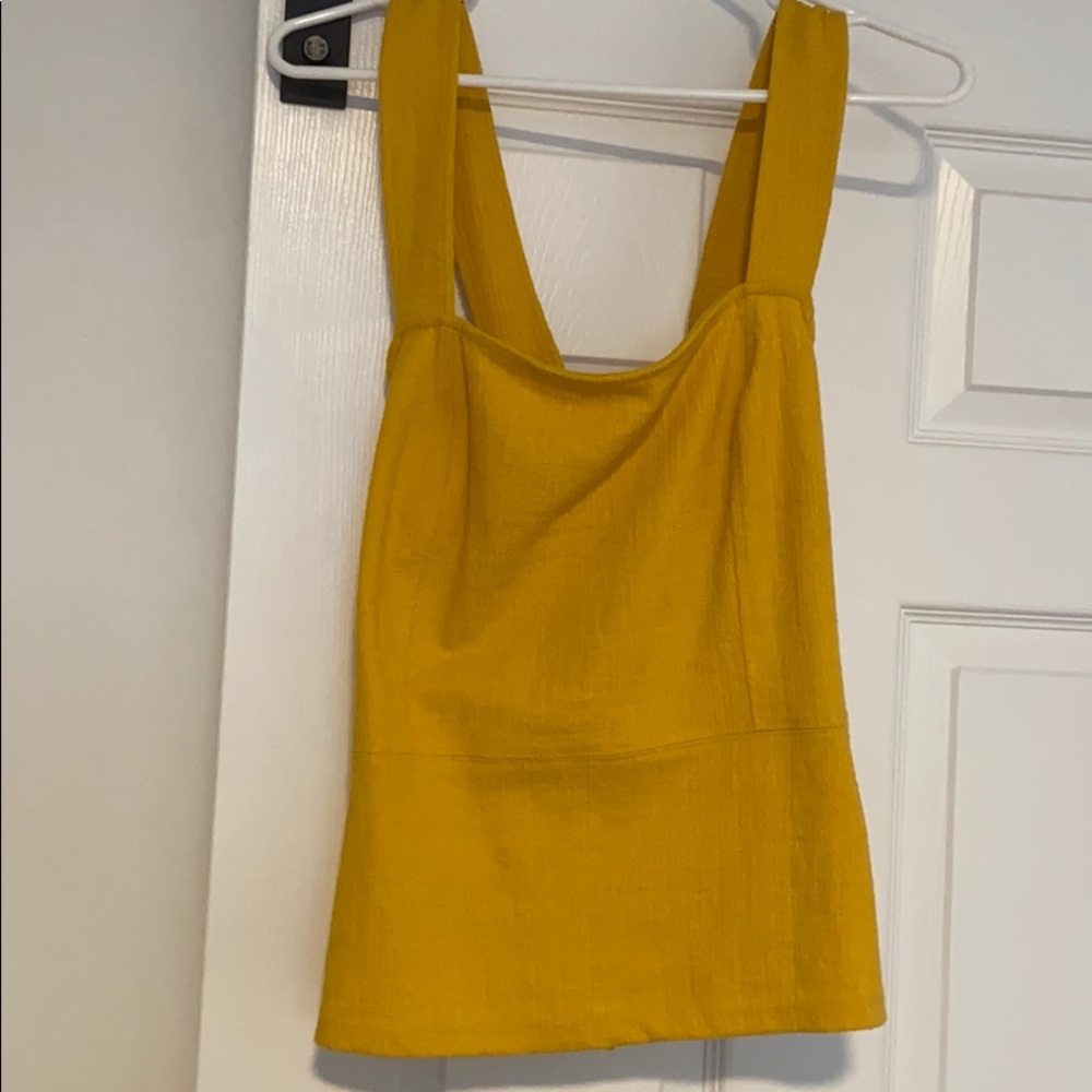 Anthropologie yellow cross back top